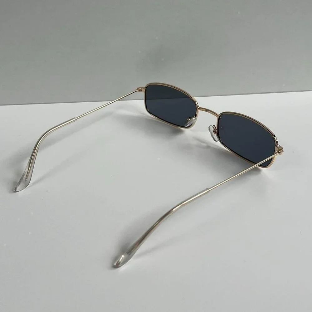 vintage y2k 90s 2000s unique slim style gold trim sunglasses